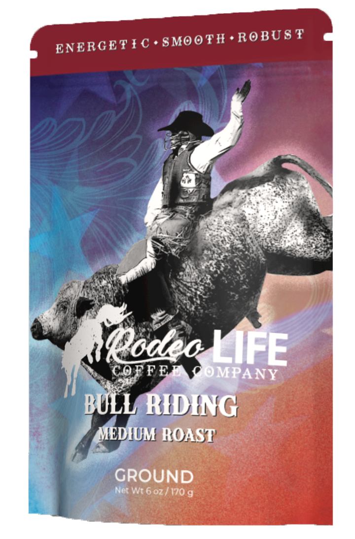 Bull rider holding on tightly during intense bucking moment